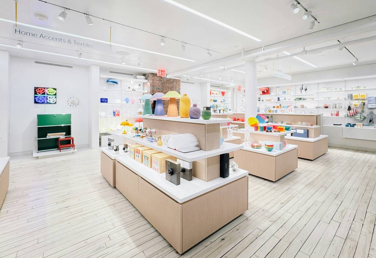 lighting in retail store showing layered ambient and accent lights highlighting clothing displays